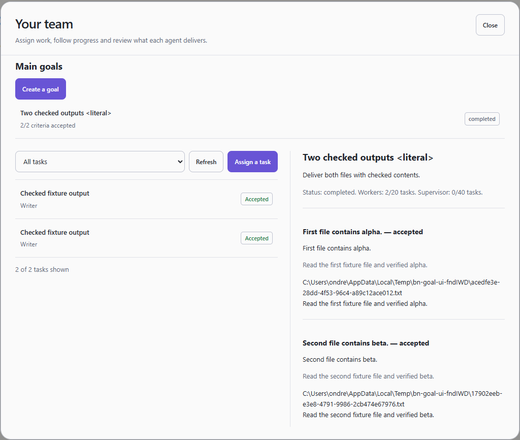 The Team panel with a completed goal: the goal row reads 2/2 criteria accepted with status completed, two accepted tasks on the left, the goal detail with two accepted criteria and their evidence on the right